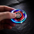 Spinner métal à effet lumineux : en rotation lumineuse entre les doigts