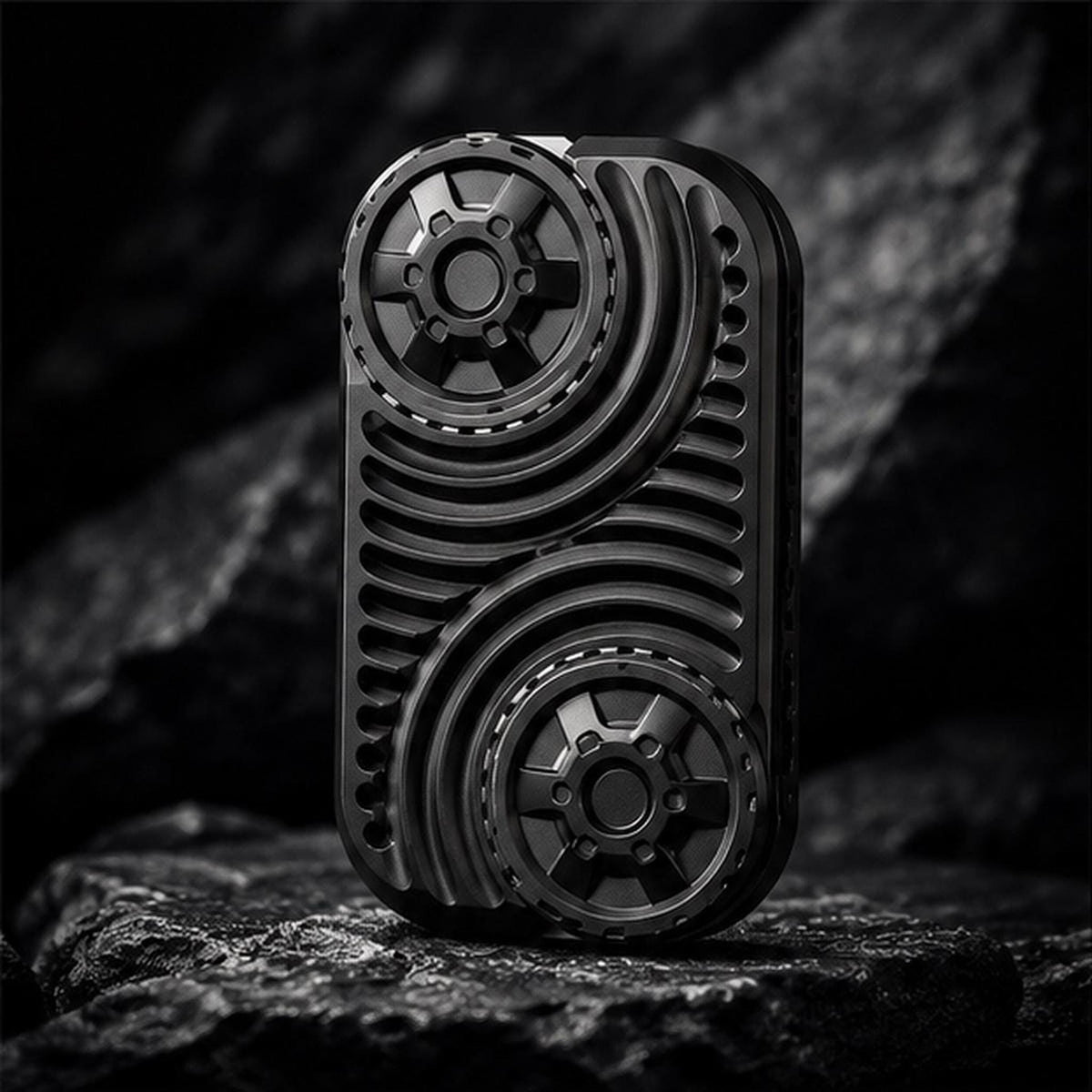 Slider magnétique strié : noir posé sur pierre